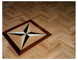 New parquet flooring, Woodford. Oak parquet wood floor with feature star inset..