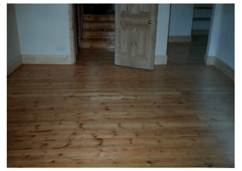 Floorboard stripping in Palmers Green. We sanded these existing floorboards and sealed with a varnish..