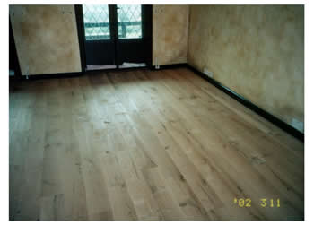 Oak floorboard sanding, Epping, Essex. Reclaimed french oakboards, sanded and finished with a teak oil..