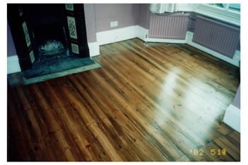 Floorboard stripping in Stansted. We sanded the existing floorboards before filling the gaps, staining and sealing with a varnish..