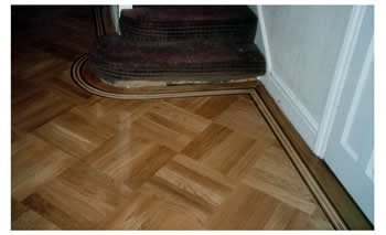 New parquet flooring in Potters Bar, Herts. Parquet wood floor laid in basket weave pattern with curved border..