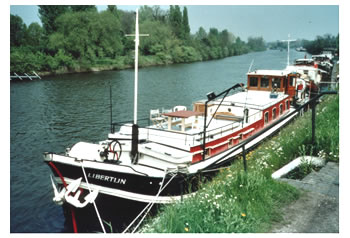 New wood floor, Kingston upon Thames. This new wooden flooring was installed in a boat.   We installed a maple floor..