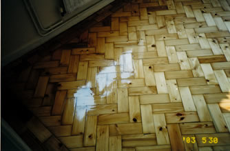 Rustic pine block wood sanding. We sanded this existing wooden floor and varnished with a Bona kemi gloss varnish finish..