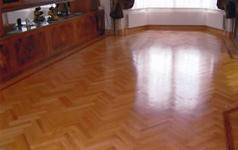 American red oak wood floor installation. We installed this new american red oak wood flooring in a double herringbone pattern with a border made from jatoba, wenge and afromosia..