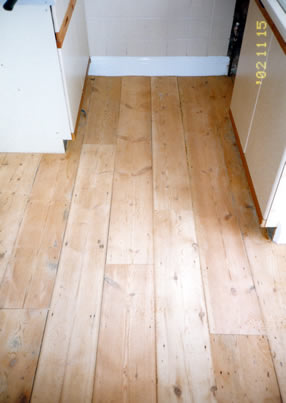 Pine floor board stripping in Harlow, Essex. We stripped and sanded these existing pine floorboards..